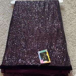 Beautiful sequenced saree with designer pallu and semi stitched blouse.